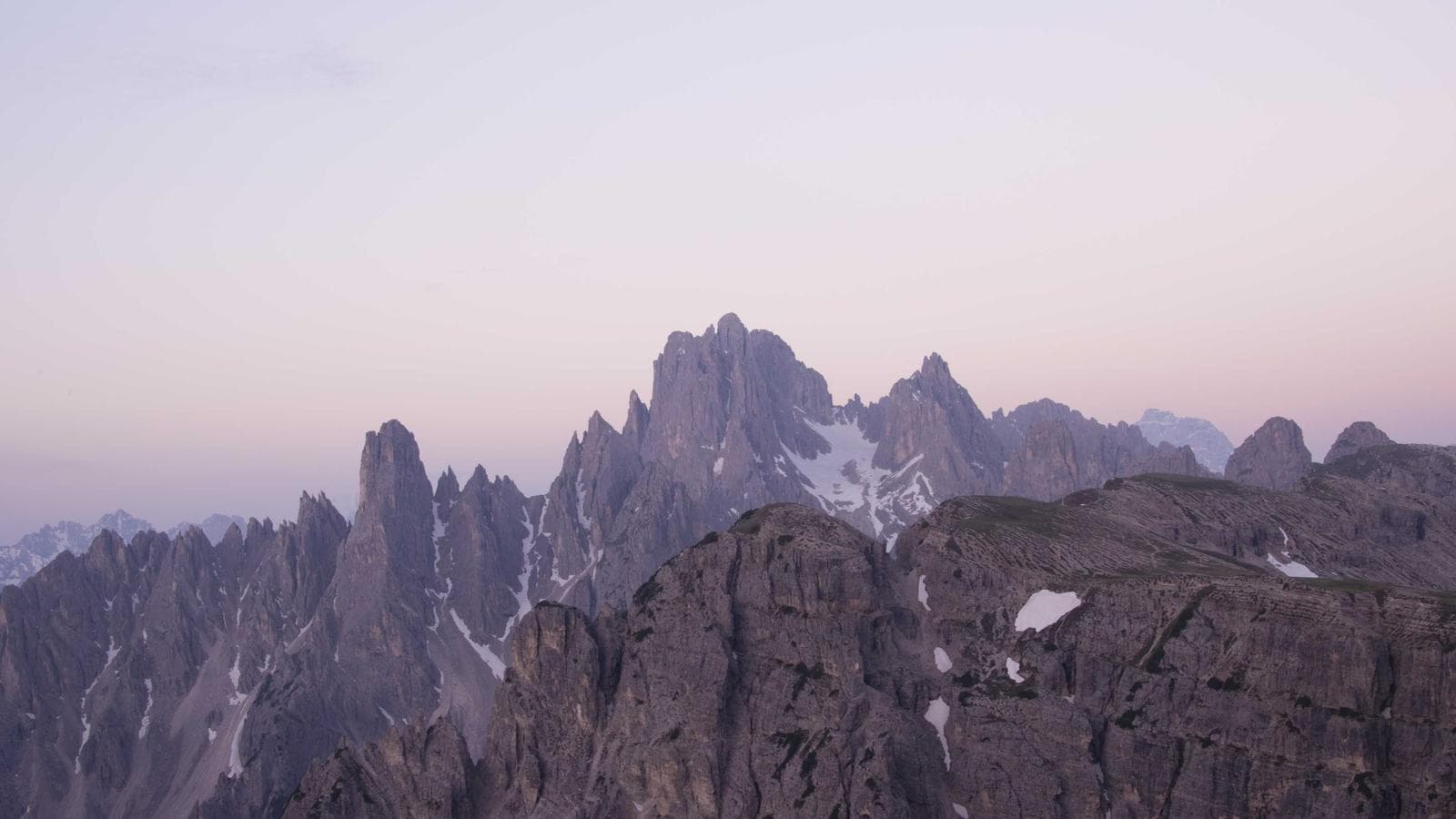 Why everyone is suddenly wearing a cardigan as a scarf.